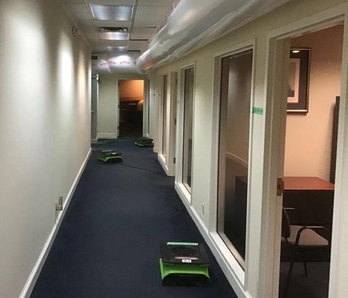 drying equipment placed in hallway in Mansfield