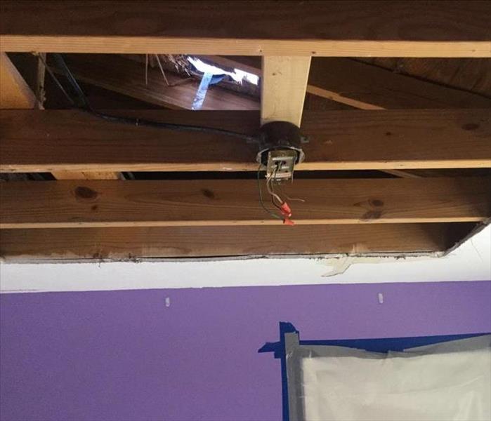 Ceiling torn out in preparation for storm damage repair in Cleveland